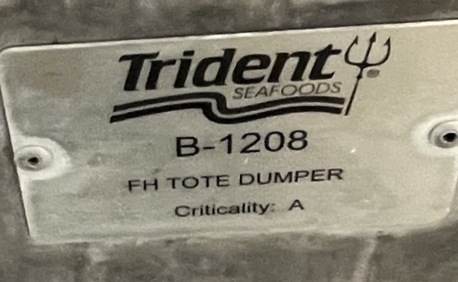 CGATP tag on weathered Trident Seafoods FH tote dumper B-1208